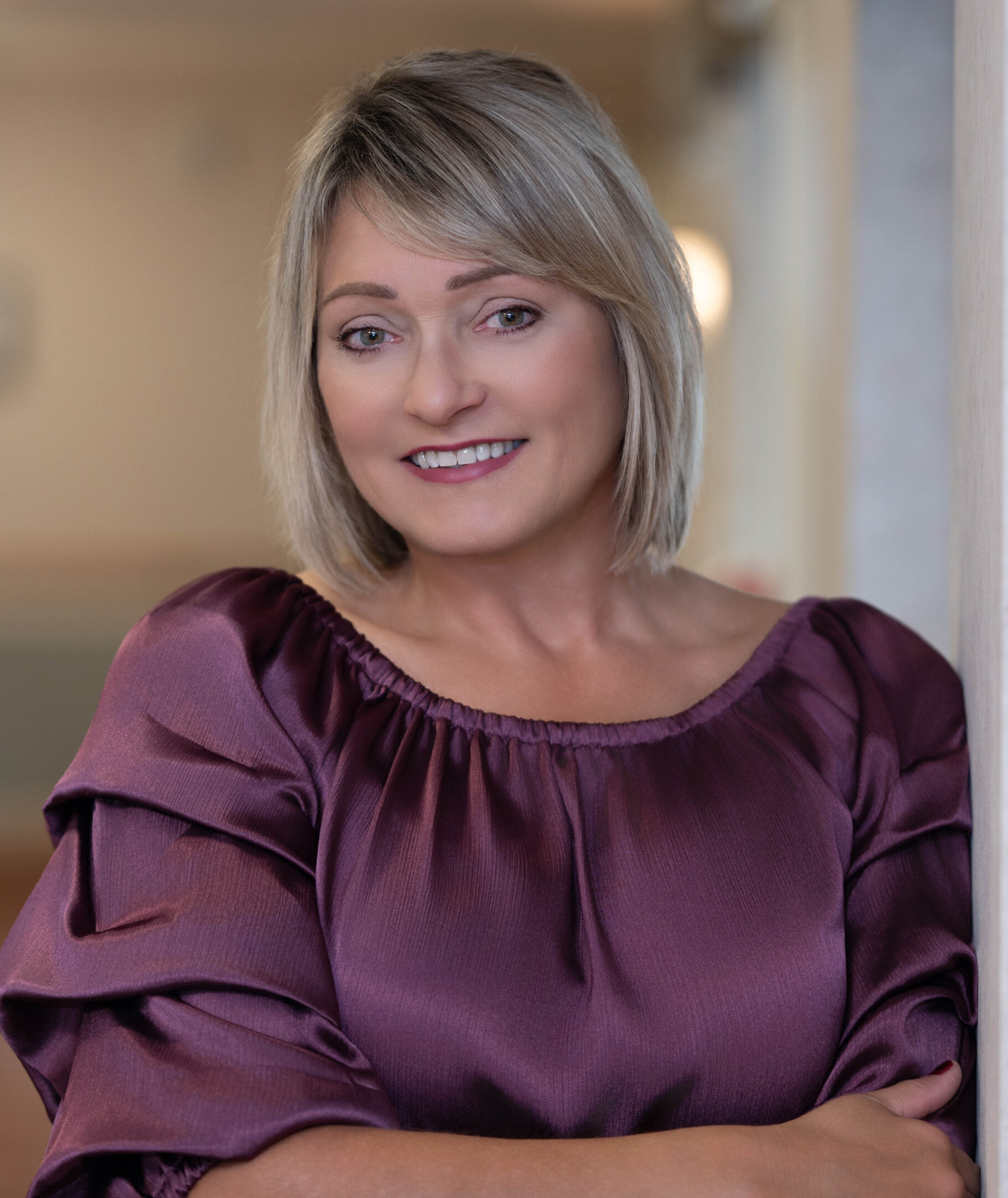 headshot of Erin Roumell with Arden Courts