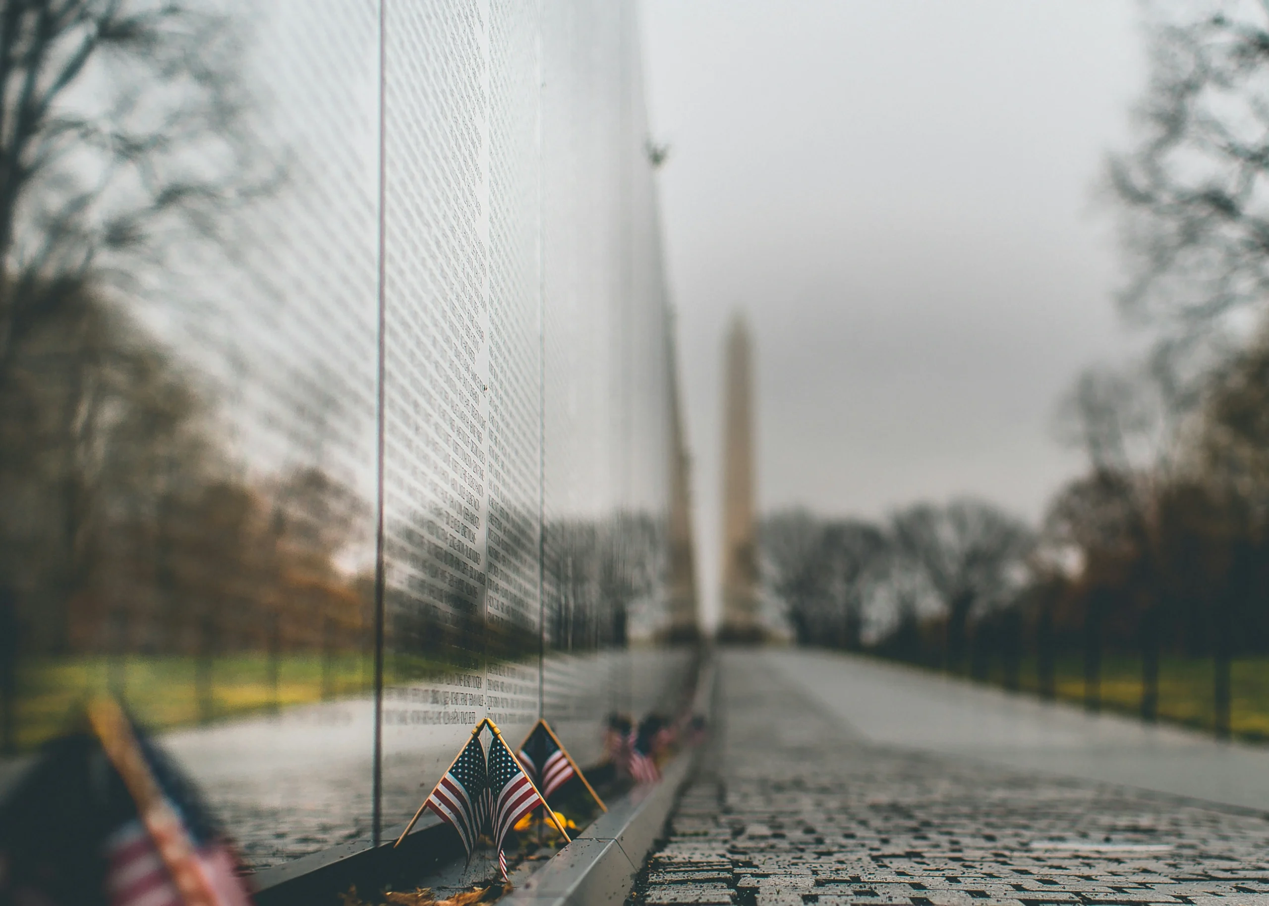 memorial for fallen veterans in Washington DC with memorial flags at the base